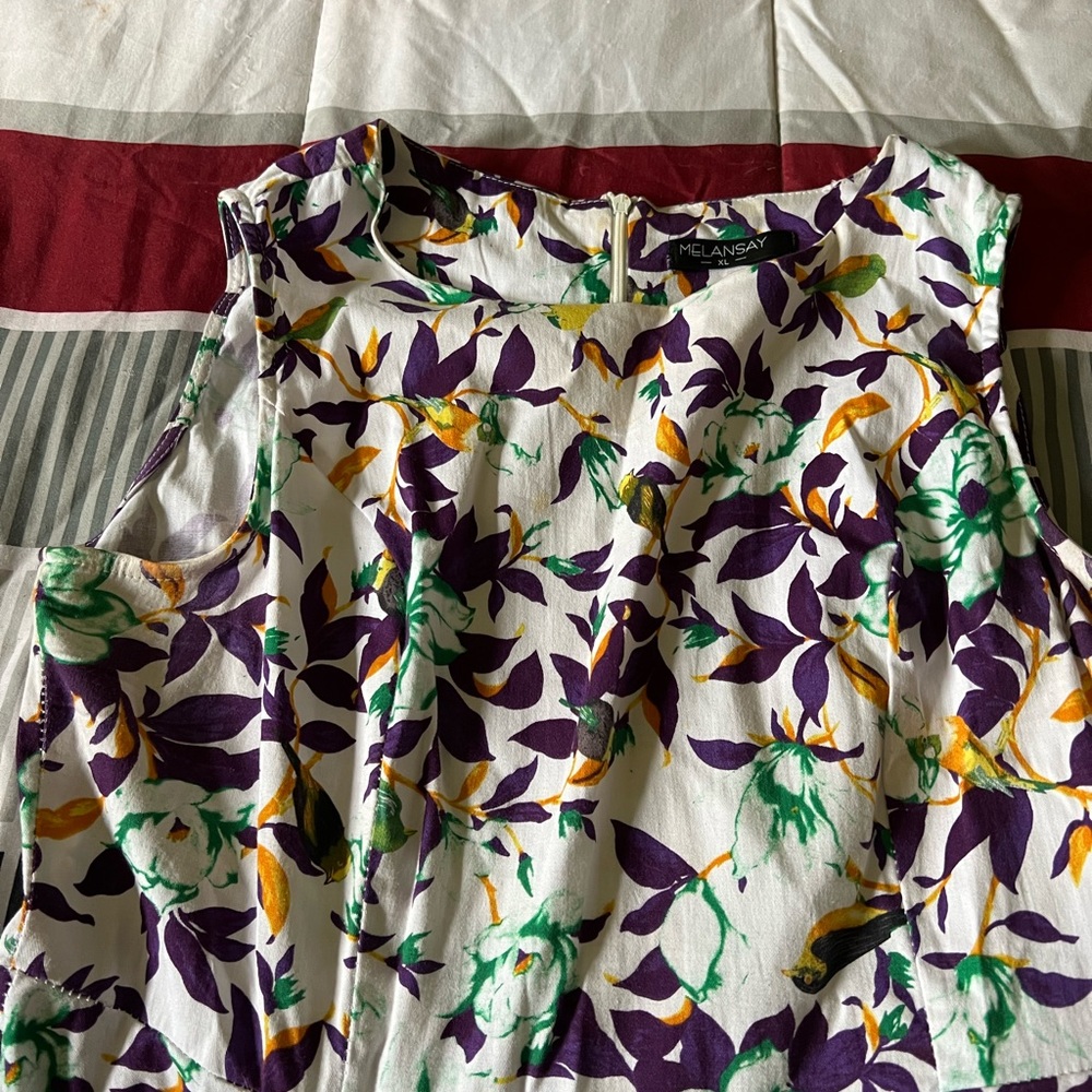 Swing dress worn once at a party. Beautiful colors.